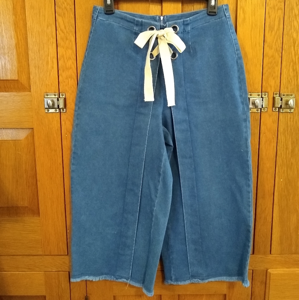 Brittany Humble lace up cropped raw hem wide leg jeans